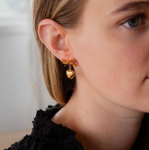 These are the cutest earrings for your Valentine's Day plans! They are a...