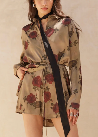 A floral-print satin romper with the following features: Layered design ...