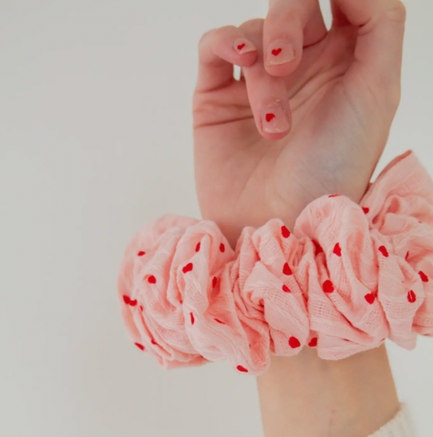 This jumbo scrunchie is the perfect addition to your Valentine's accesso...